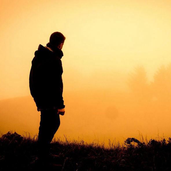 Silhouette of a man at sunset